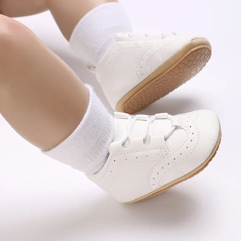 Baby Anti-Slip First Steps shoes in chic black color, perfect for infants taking their first steps.