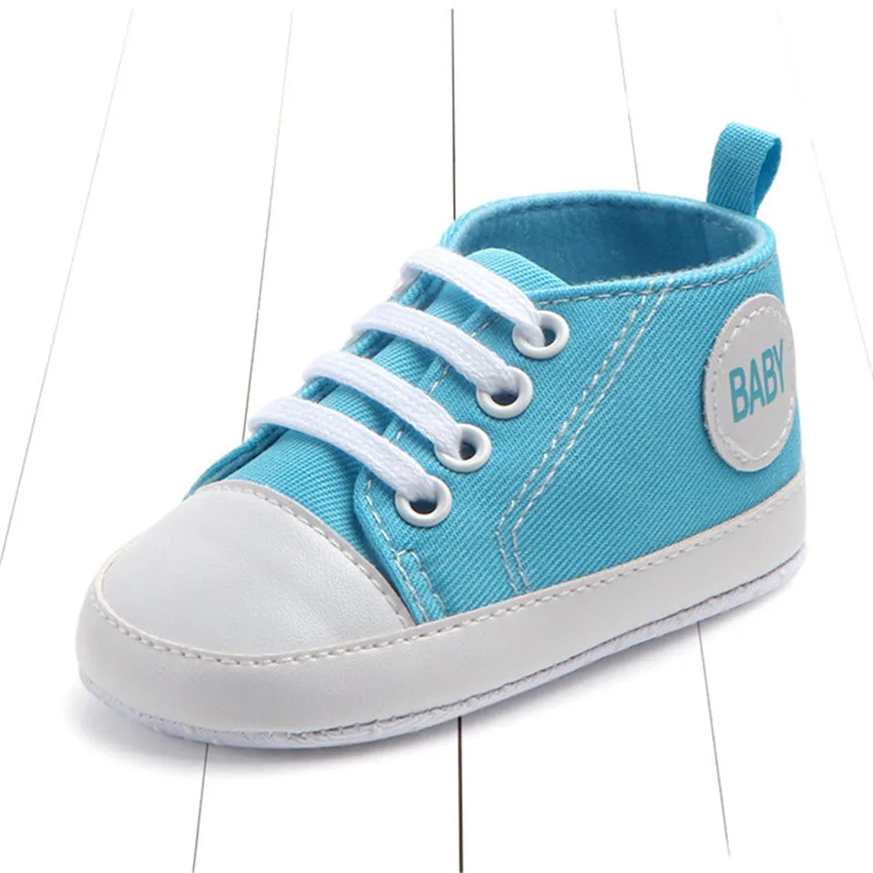 Baby's Canvas Soft Sole Lace-up First Walkers in Sky Blue, perfect for infants learning to walk.