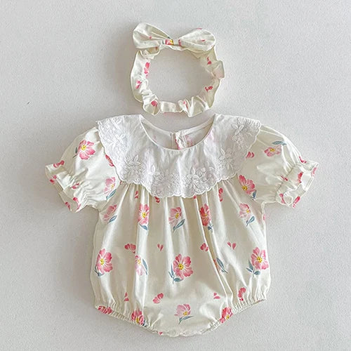 Vintage Outfits for toddlers, featuring a delightful floral romper with a lace trim collar and a sweet matching headband.