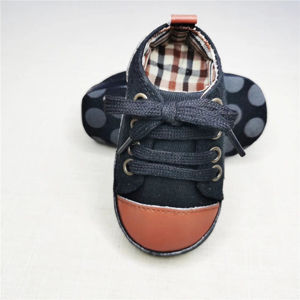 Baby's Canvas Lace-up First Walkers in Palm Beach Brown Plaid design, featuring durable canvas upper and soft cork sole for comfort.