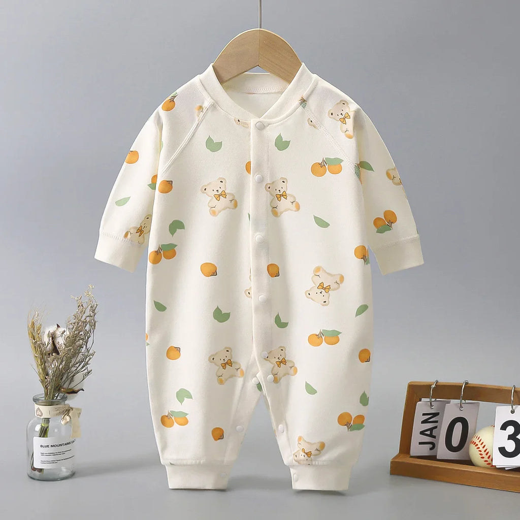 Adorable 'Baby Bear' Baby's Print Romper featuring a cute bear print design with vibrant orange accents. Perfect for keeping your little one stylish and comfy.