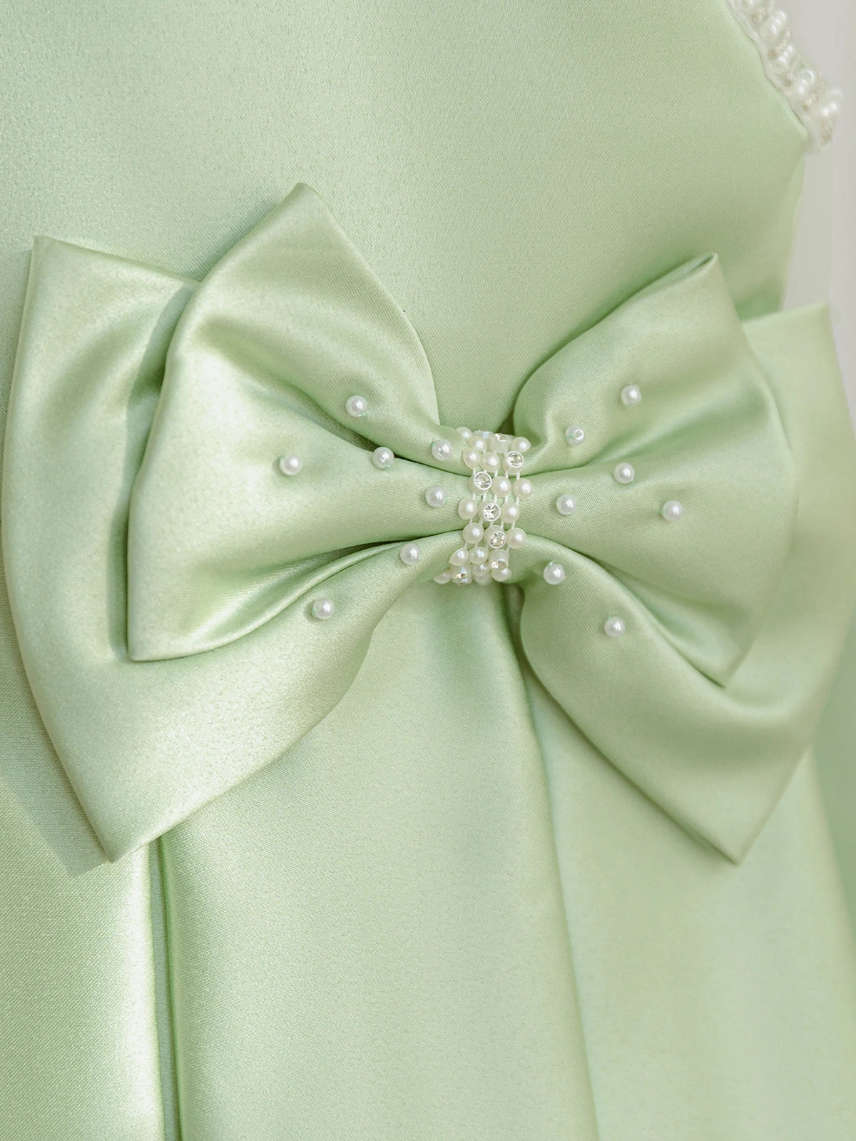 Mint green satin Taylor Elegant Beaded Formal Party Dress with a large beaded bow and pearl embellishment