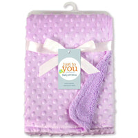Lavender baby blanket packaged with white ribbon; soft polyester, 100x70 cm, for newborns and infants.