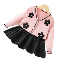 Vanessa Floral Knitted Cardigan and Pleated Skirt Set in pink with black flower appliques and button cardigan