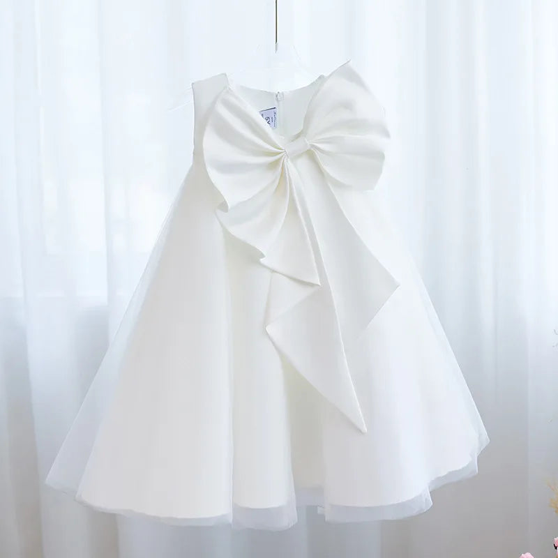 White Sari-Elle Elegant Party Dress With Large Bow for girls, A-line party dress on hanger.