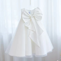 White Sari-Elle Elegant Party Dress With Large Bow for girls, A-line party dress on hanger.