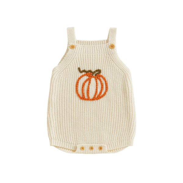 Cream knit romper overalls for babies featuring an orange pumpkin applique, wooden shoulder buttons, and bottom snap closure.