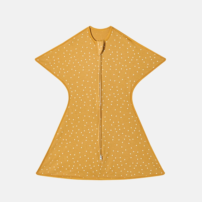 Cute mustard-colored lightweight baby sleep sack with polka dots, designed for comfort and style.