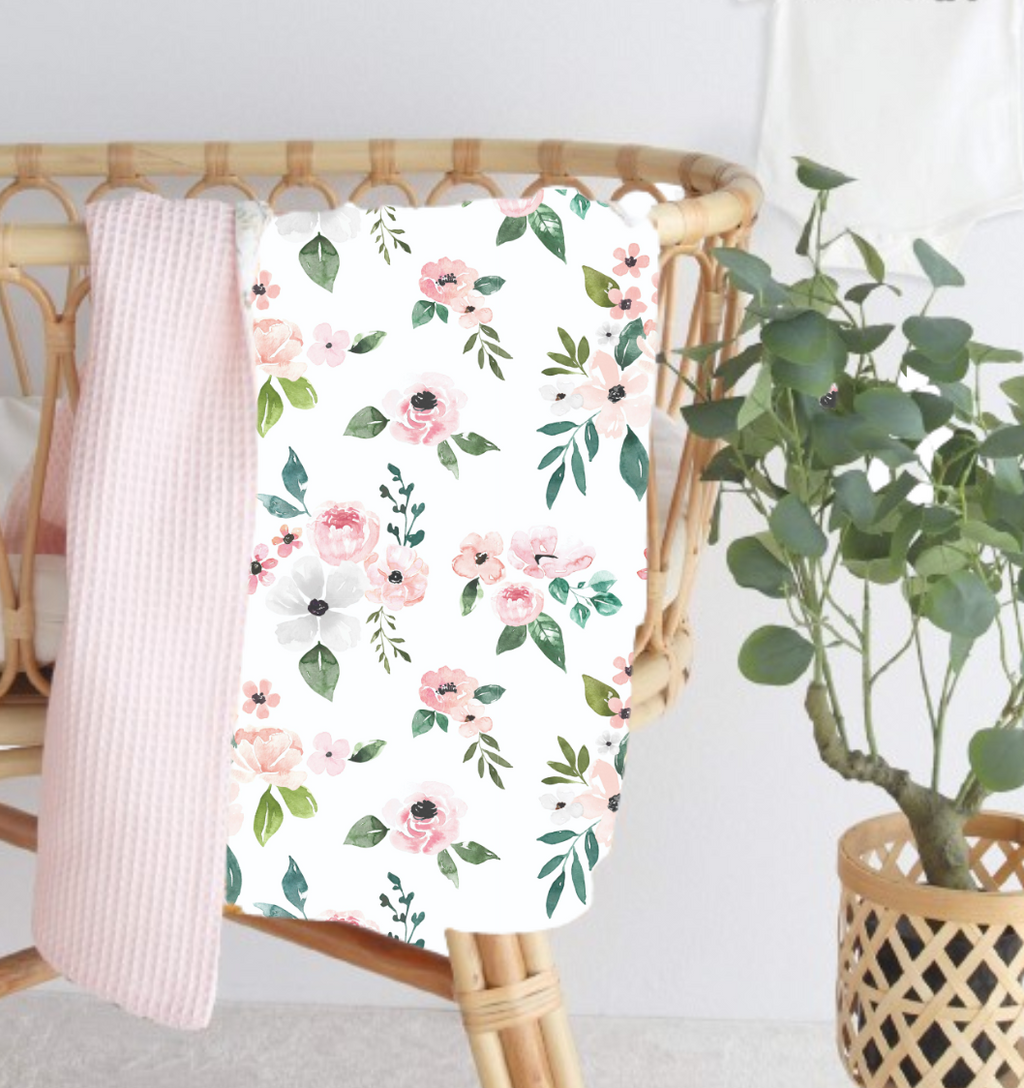 Floral Muslin/Waffle Blanket by Growing Sprouts - A stylish and cozy blend of muslin and waffle textures perfect for babies, with vibrant floral patterns ideal for any nursery decor.