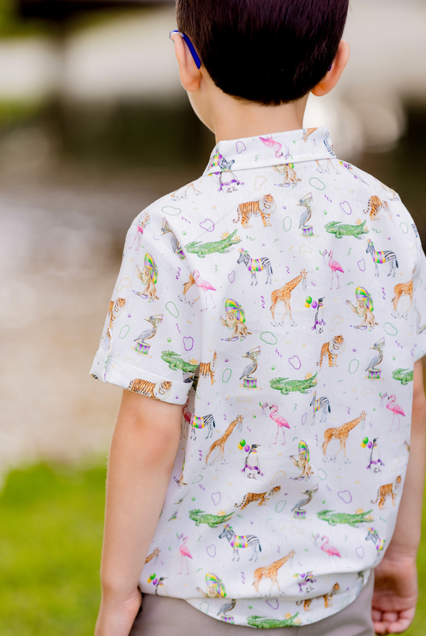 Child wearing a shirt with animal print outdoors