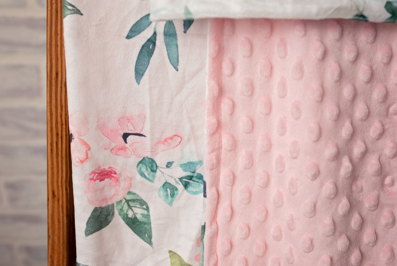 Flowers Forever Minky Blanket in pink, perfect for snuggling babies with its soft and cozy design, adding a touch of style to any nursery.