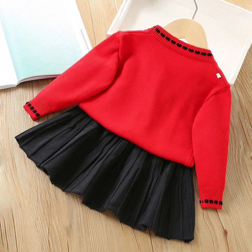 Vanessa Floral Knitted Cardigan and Pleated Skirt Two-Piece Set: red cardigan with black pleated skirt.