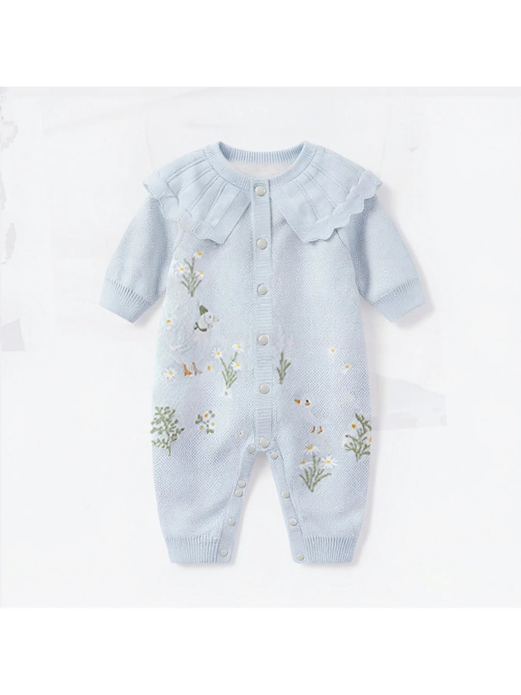 Boca Blue Fleurs Knit Long Sleeve Baby Romper featuring a delicate round neckline with a ruffled collar, vibrant Boca blue color, and charming flower embroidery, perfect for baby girls.