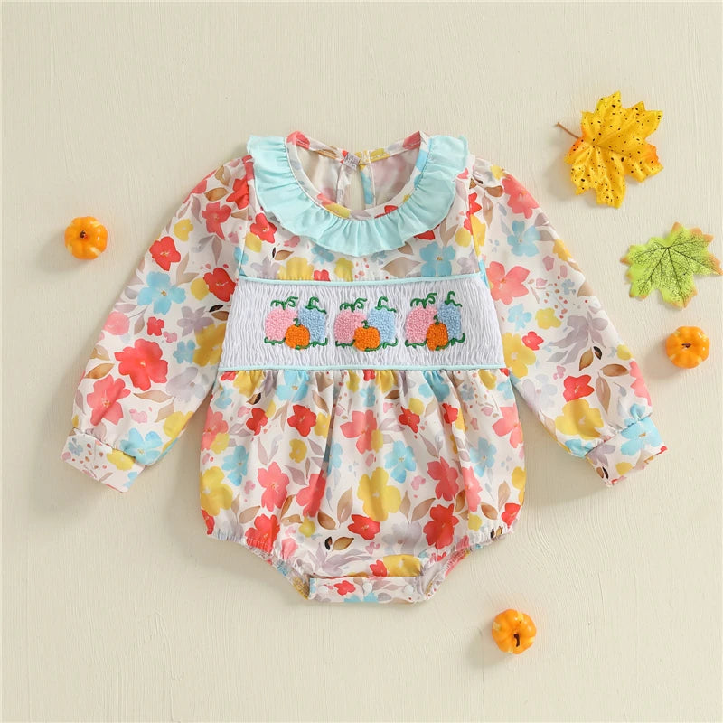 Fall Fabulous Pumpkin Embroidered Bubble romper featuring colorful floral prints, ruffled neckline, and embroidered pumpkins, perfect for autumn wear.