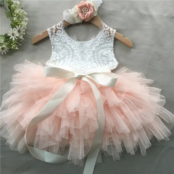 Elegant Roxane vintage-inspired girls beaded dress with lace bodice, pink tulle skirt, and 3-piece belt and headband set.