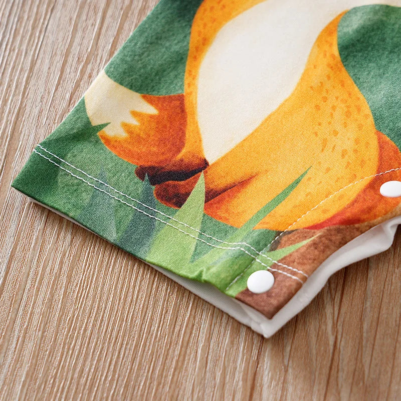 Detail shot of the hemline on the Cute 'Forest Animals' Baby Romper for Boys - Highlighting the quality fabric and snap closures.