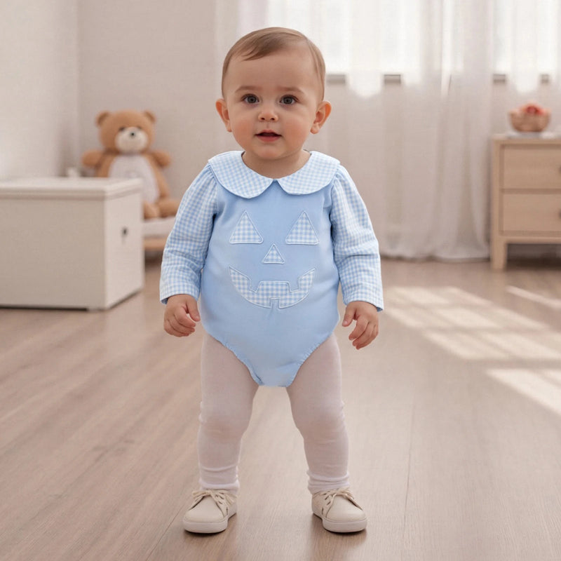 Toddler in the "Peter Pumpkin" Adorable Baby Blue Romper with Snaps, standing confidently in a cheerful setting, ideal for Halloween.