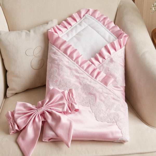 Palm Beach pink satin baby receiving blanket with lace, ruffles, envelope wrap, and big bow.