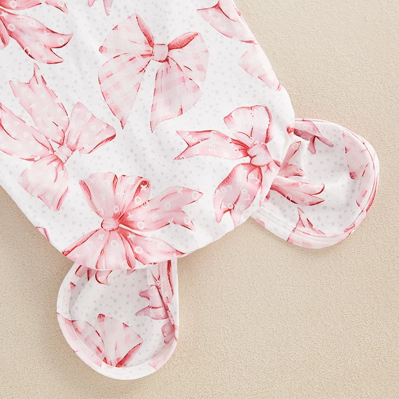 Details of the Baby Bows Knotted Infant Swaddle Gown showing the bow print design, ideal for stylish and comfortable infant wear.