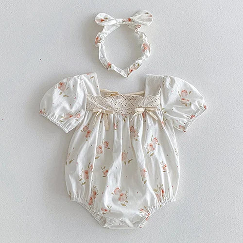 Vintage Outfits - Beautiful floral romper with puff sleeves and coordinating headband, designed for baby girls.