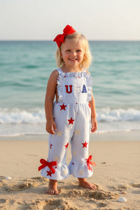Children's romper with star pattern and 'USA' text on a white background