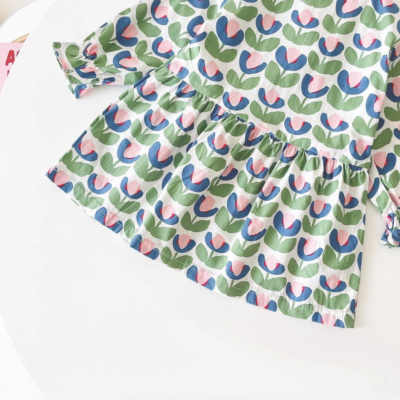Close-up detail of the "Mariella" Floral Print Peter Pan Collar Dress, emphasizing the unique floral pattern and soft fabric.