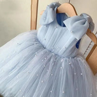 Daria Tulle and Faux Pearls Party Dress in light blue sleeveless tulle with pearl-embellished shoulder bows.