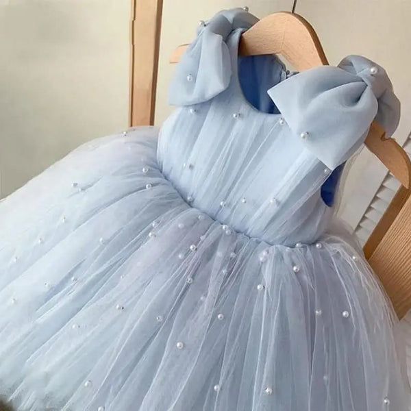 Daria Tulle and Faux Pearls Party Dress in light blue sleeveless tulle with pearl-embellished shoulder bows.