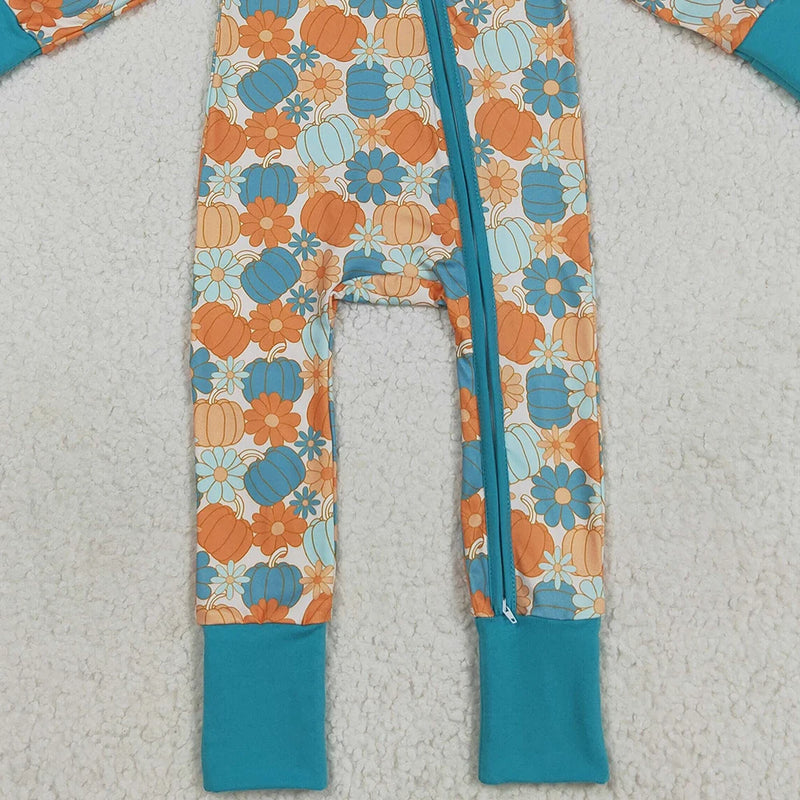 Detailed view of the zipper area on the Pumpkins & Flowers Colorful Zippered Romper - Teal, showcasing the playful pumpkin design.