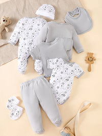 8-piece baby layette set in soft gray with bear print, 100% cotton for 0-9 months.