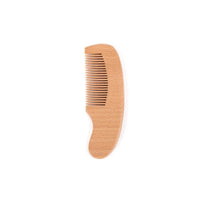 Natural wooden baby to toddler comb with rounded handle and fine teeth.