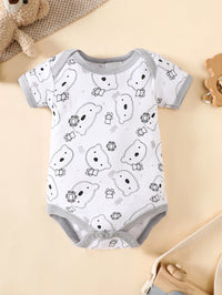 8-piece layette set in combed cotton with a cute grey bear print for 0-9M infants.