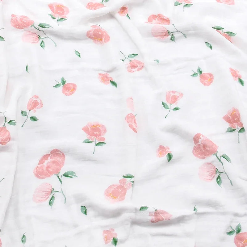 White two-layer bamboo-cotton baby blanket with pink rose floral pattern for newborn swaddling.