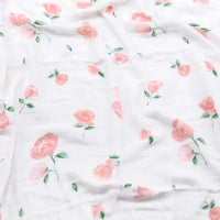White two-layer bamboo-cotton baby blanket with pink rose floral pattern for newborn swaddling.