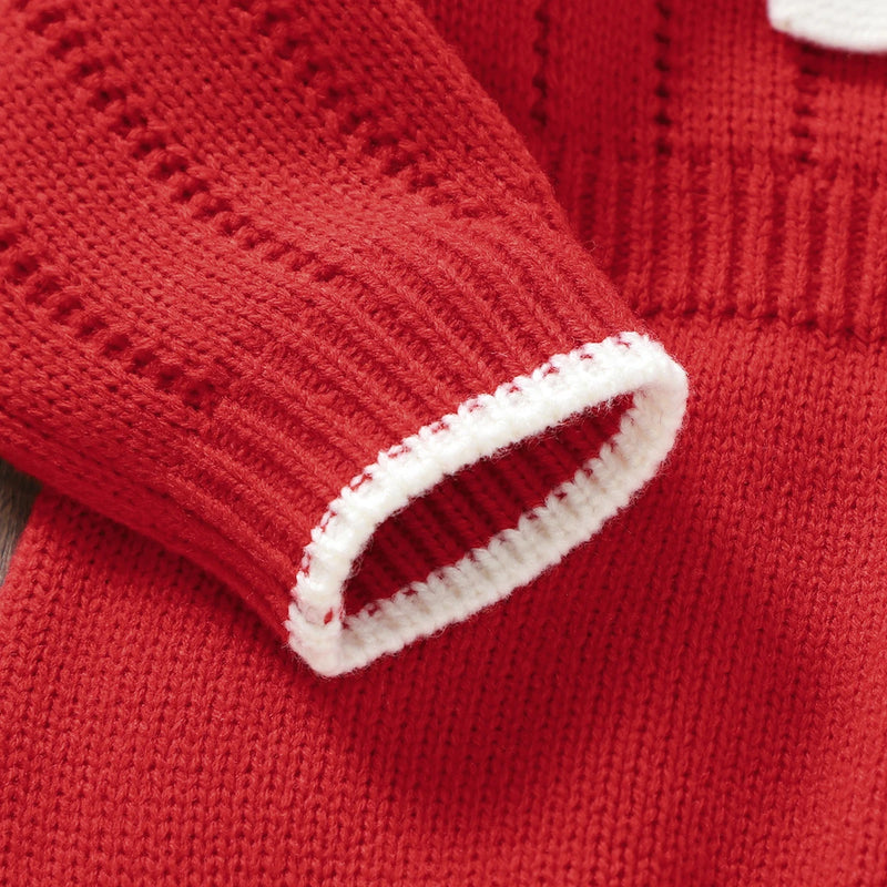 Close-up of the sleeve cuff of the Bowtie Cutie Long Sleeve Knitted Bubble in Holiday Red, featuring stylish white trim.