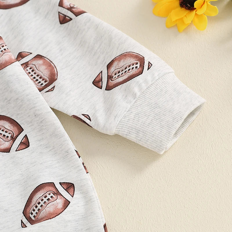 Close-up of the cuff on the Fun 'Football Cutie' Baby Romper With Football Print, featuring soft fabric and sporty design.