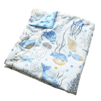 Dotted Minky Blanket with 31 colorful ocean-print designs for babies and young children.