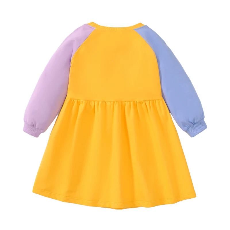 Back view of the colorful girls dress showcasing the blended purple and yellow sleeves, adding a unique touch.