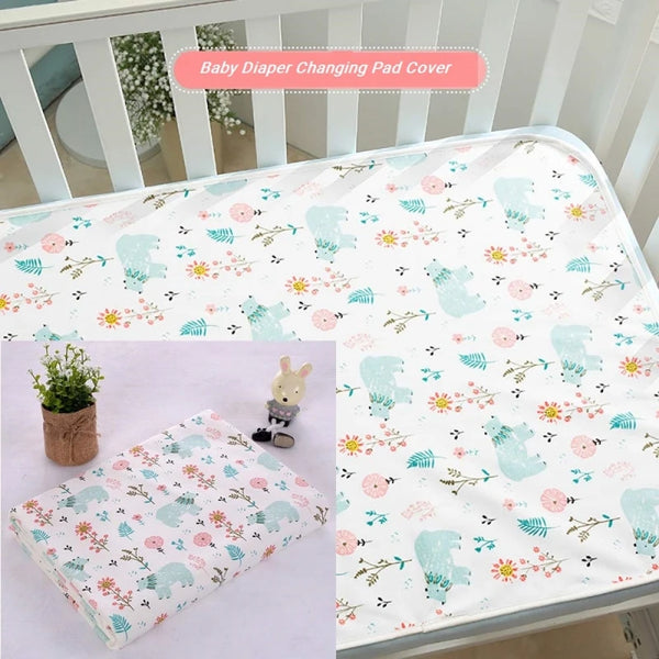 Waterproof baby changing pad cover in pastel prints with light blue elephants and flowers; cotton, 50x70 cm or 70x90 cm.