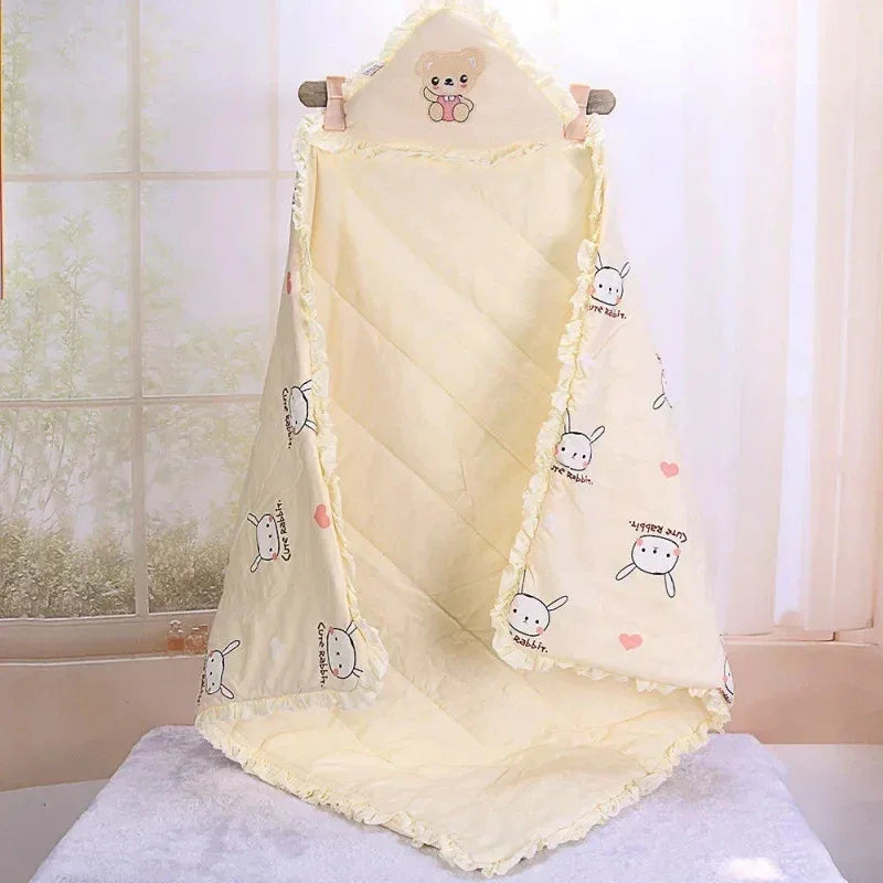 Light blue 'Animal Cutie' baby swaddle wrap with adorable designs, making it ideal for both daytime and nighttime use.