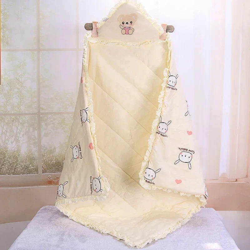 Light blue 'Animal Cutie' baby swaddle wrap with adorable designs, making it ideal for both daytime and nighttime use.