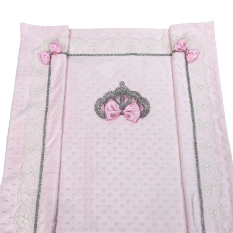 Pink Minky heirloom baby blanket with raised dots, crystal-accented silver crown and pink bow, lace trim.