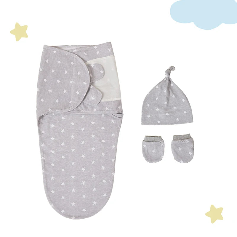 Cozy Baby Swaddle Set with Hat in gray, featuring star patterns and designed for snug and secure swaddling.