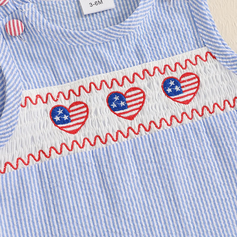 Close-up of the heart-shaped flag embroidery on the 'Patriotic Cutie' Striped Sleeveless Baby Romper, adding a patriotic flair.