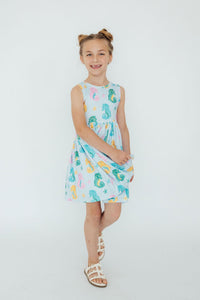 Back view of the Seahorse Swirl Tank Twirl Dress for girls, highlighting the scoop back design for easy dressing.