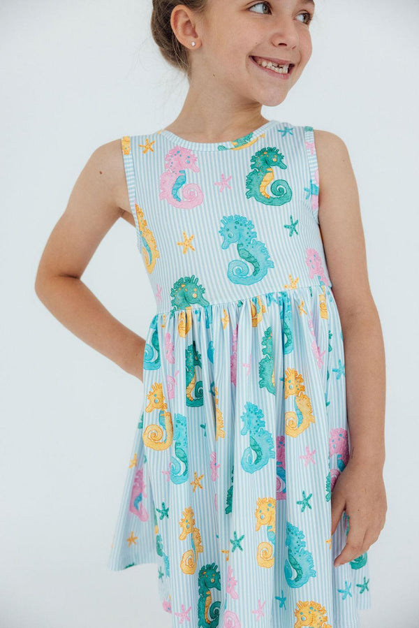 Seahorse Swirl Tank Twirl Dress for girls, showcasing a playful and swishy skirt perfect for twirling.
