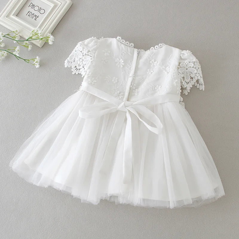 Beatrice Ann white lace dress for little girls with appliques, lantern sleeves, full tulle knee-length skirt and sash