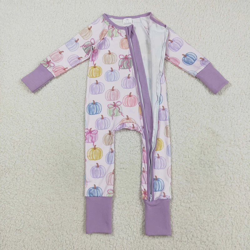 Open view of the 'Purple Pumpkin Eater' baby girl pumpkin romper showcasing vibrant pumpkin designs, perfect for fall.