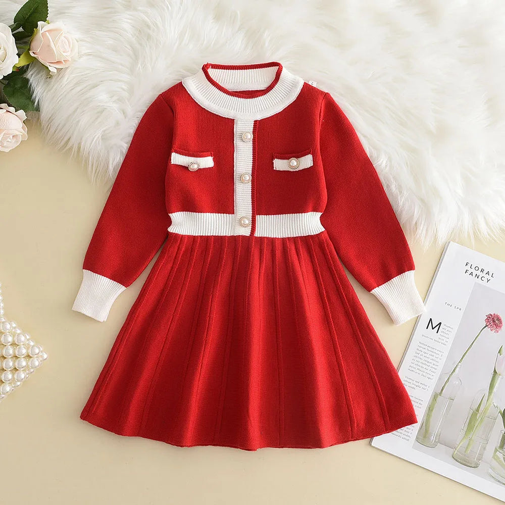 Chic Melinda Knit Dress in vibrant red with button details and flared skirt, perfect for holiday celebrations.