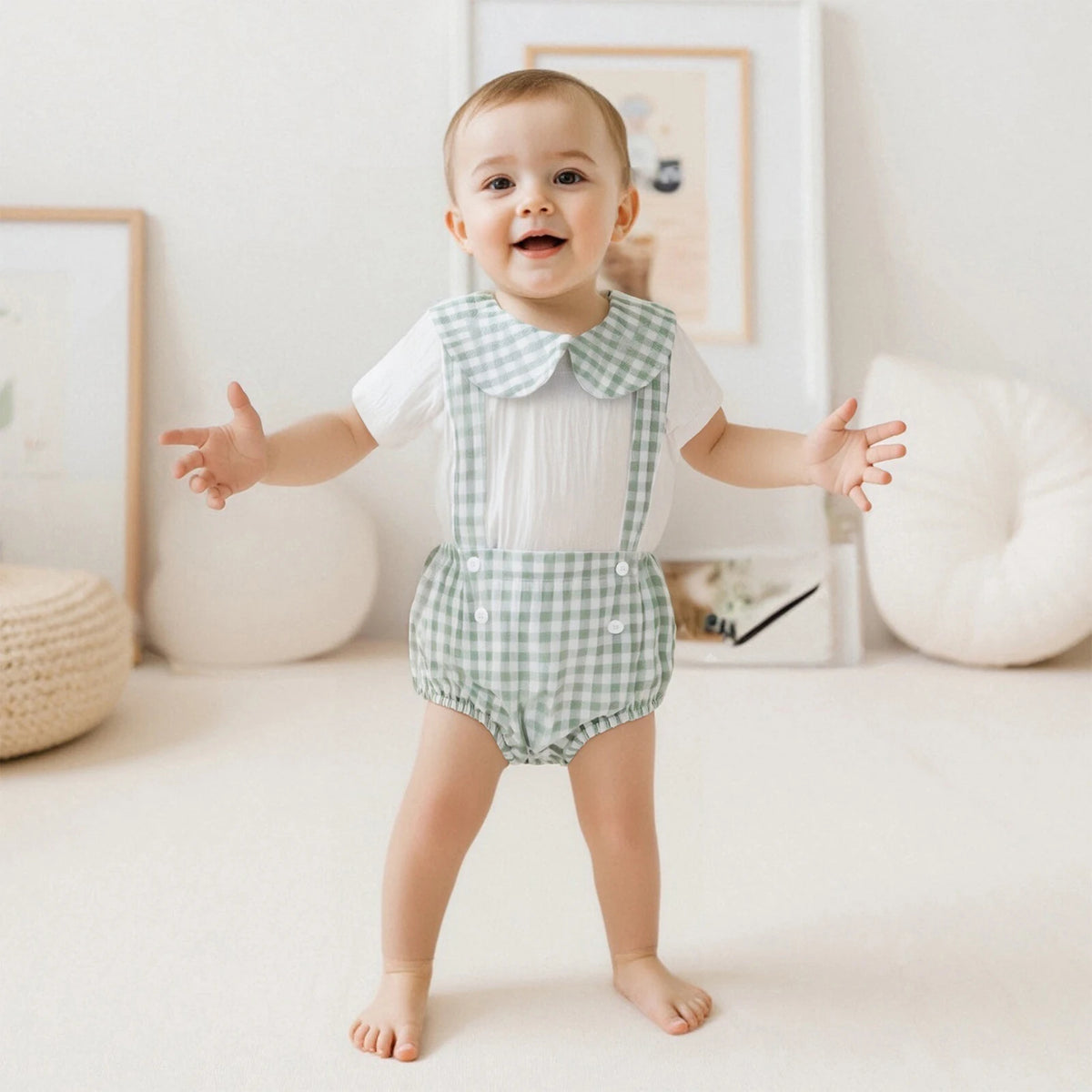 Carlton check romper and shorts two-piece outfit for boys, green gingham suspender shorts on a smiling baby.